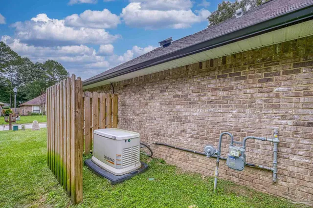 a view of a brick house with a large door