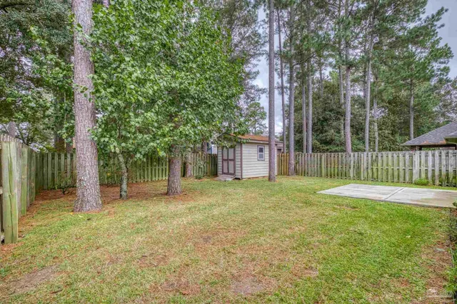 a picture of a room with a white wall and a picture