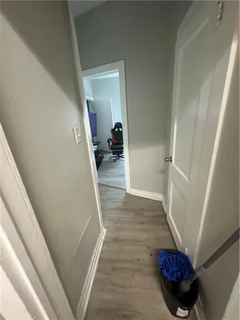 a view of a hallway view with staircase