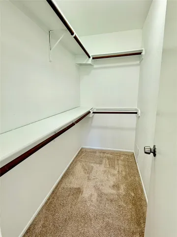 a view of a room with an empty space