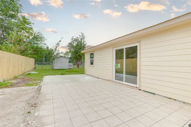 a view of a backyard with a garden