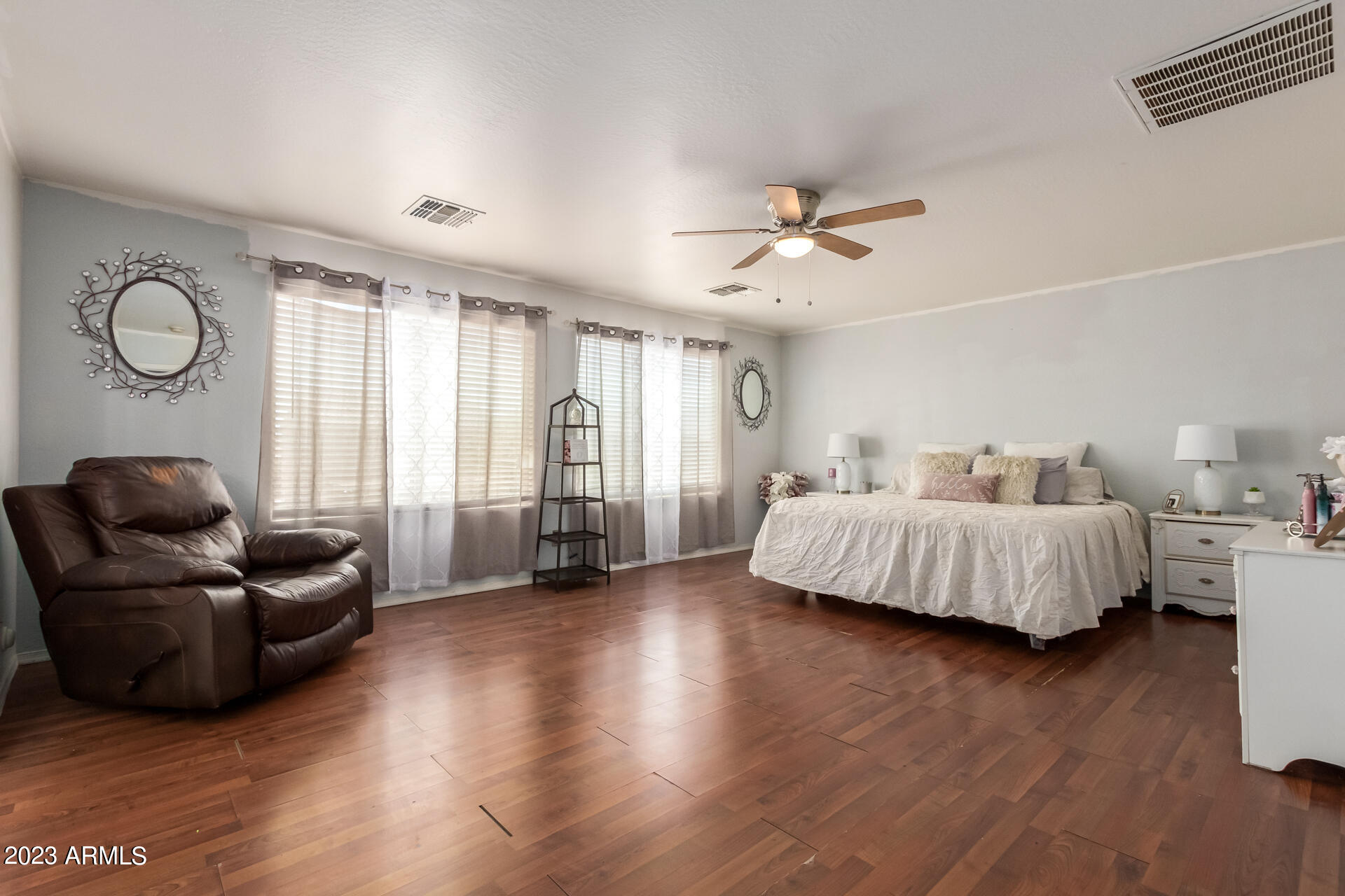 7317 West Darrel Road Laveen, AZ 85339 - Photo 7 of 13 a spacious bedroom with a bed and window