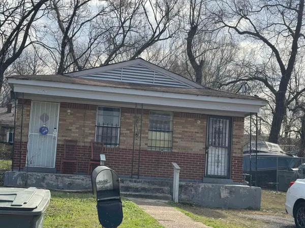 a front view of a house with patio