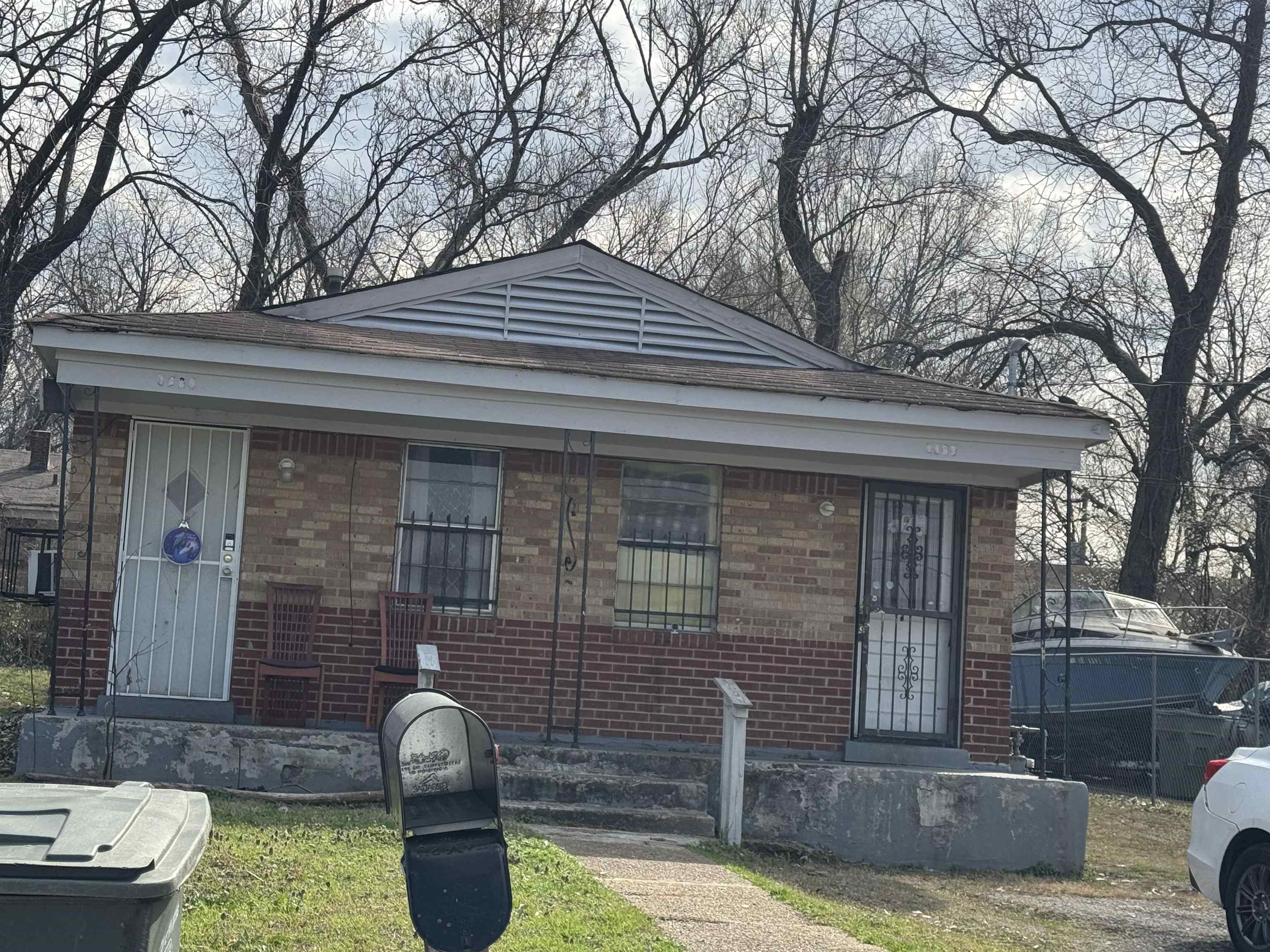 a front view of a house with patio