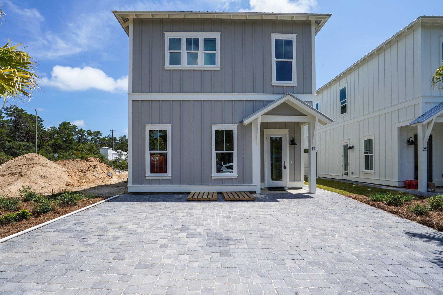 68 Sunset Key Inlet Beach, FL 32461 - Photo 1 of 29 a front view of a house with a yard