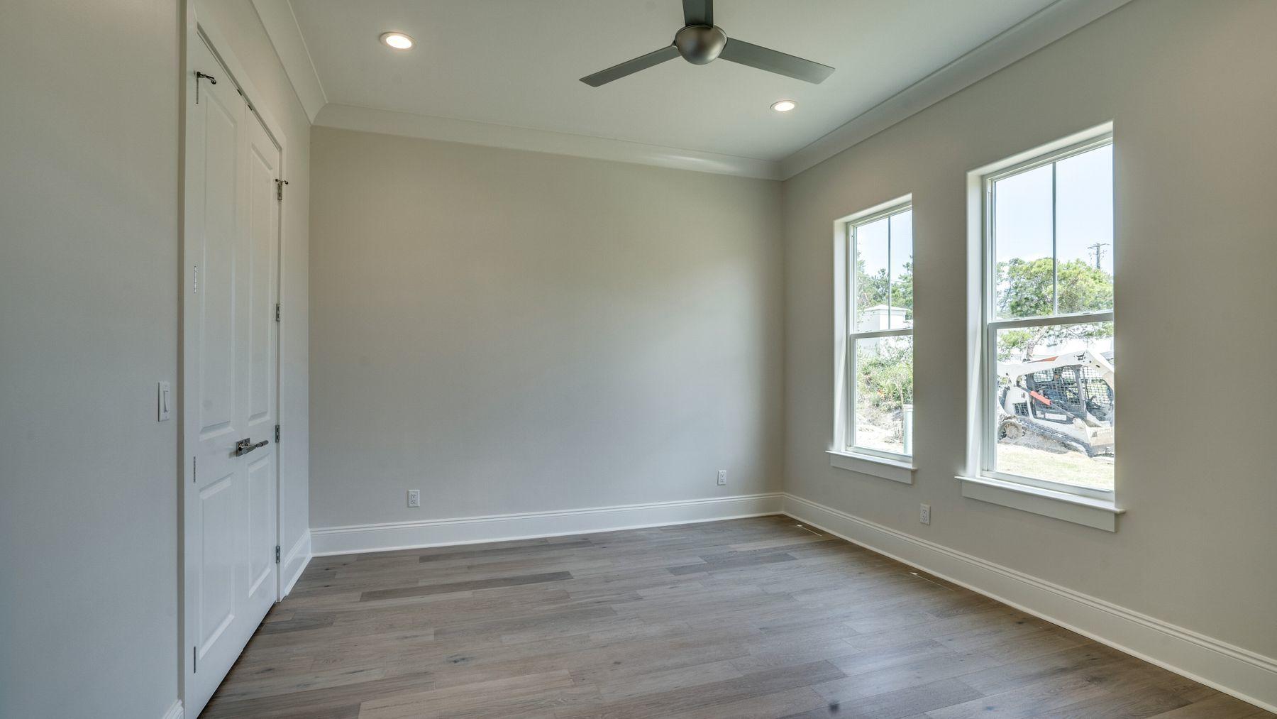 68 Sunset Key Inlet Beach, FL 32461 - Photo 11 of 29 a view of an empty room with a window and wooden floor