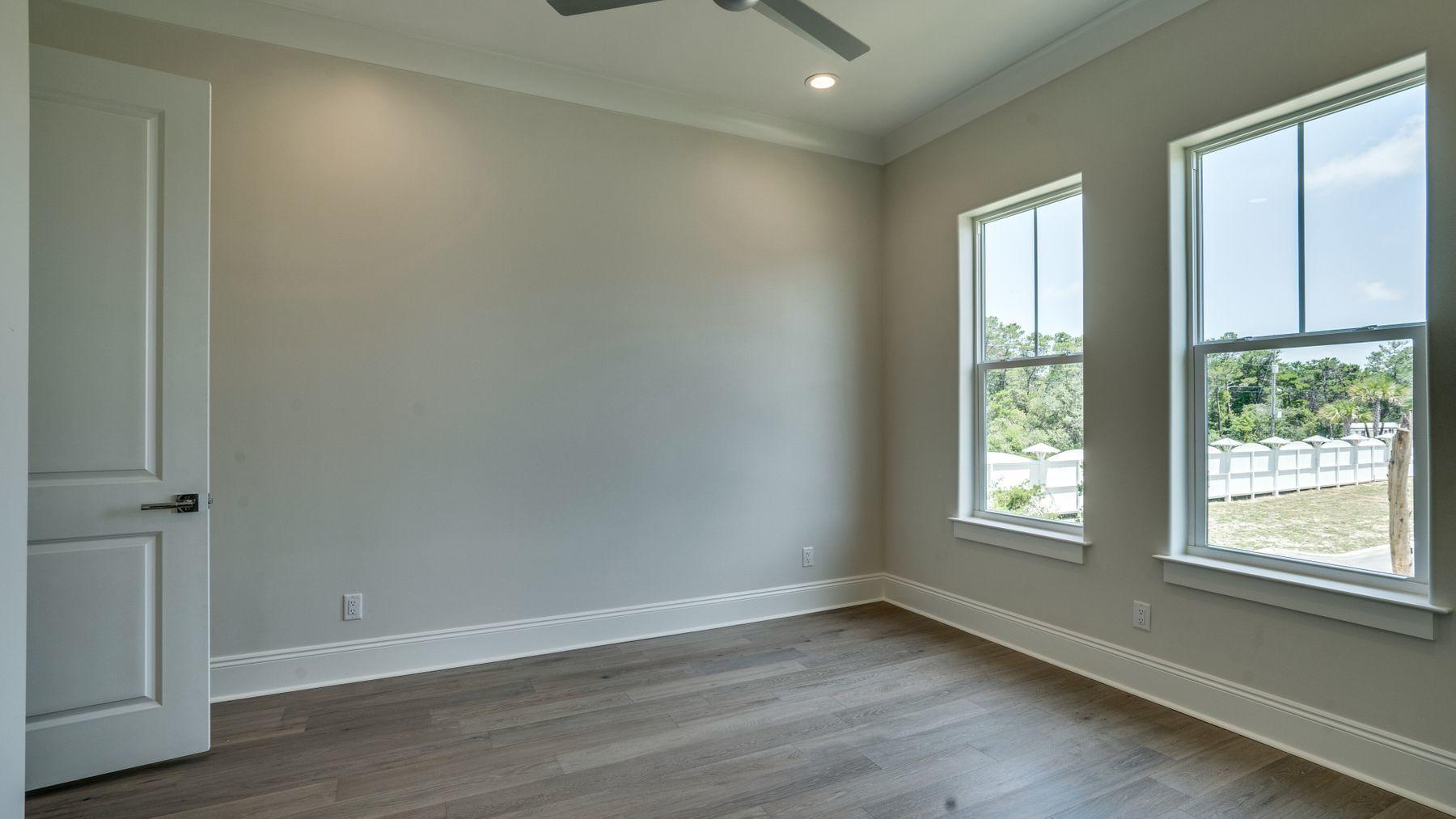 68 Sunset Key Inlet Beach, FL 32461 - Photo 19 of 29 an empty room with wooden floor and windows