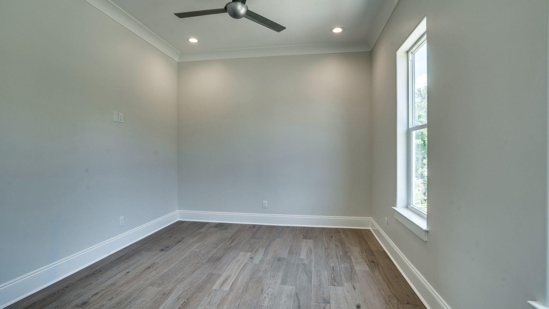 68 Sunset Key Inlet Beach, FL 32461 - Photo 23 of 29 a view of empty room with wooden floor and fan