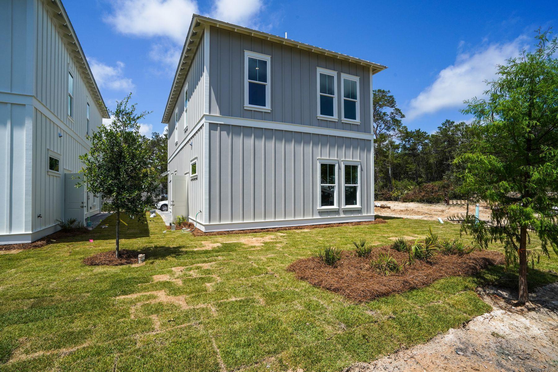 68 Sunset Key Inlet Beach, FL 32461 - Photo 28 of 29 a view of a house with backyard and sitting area