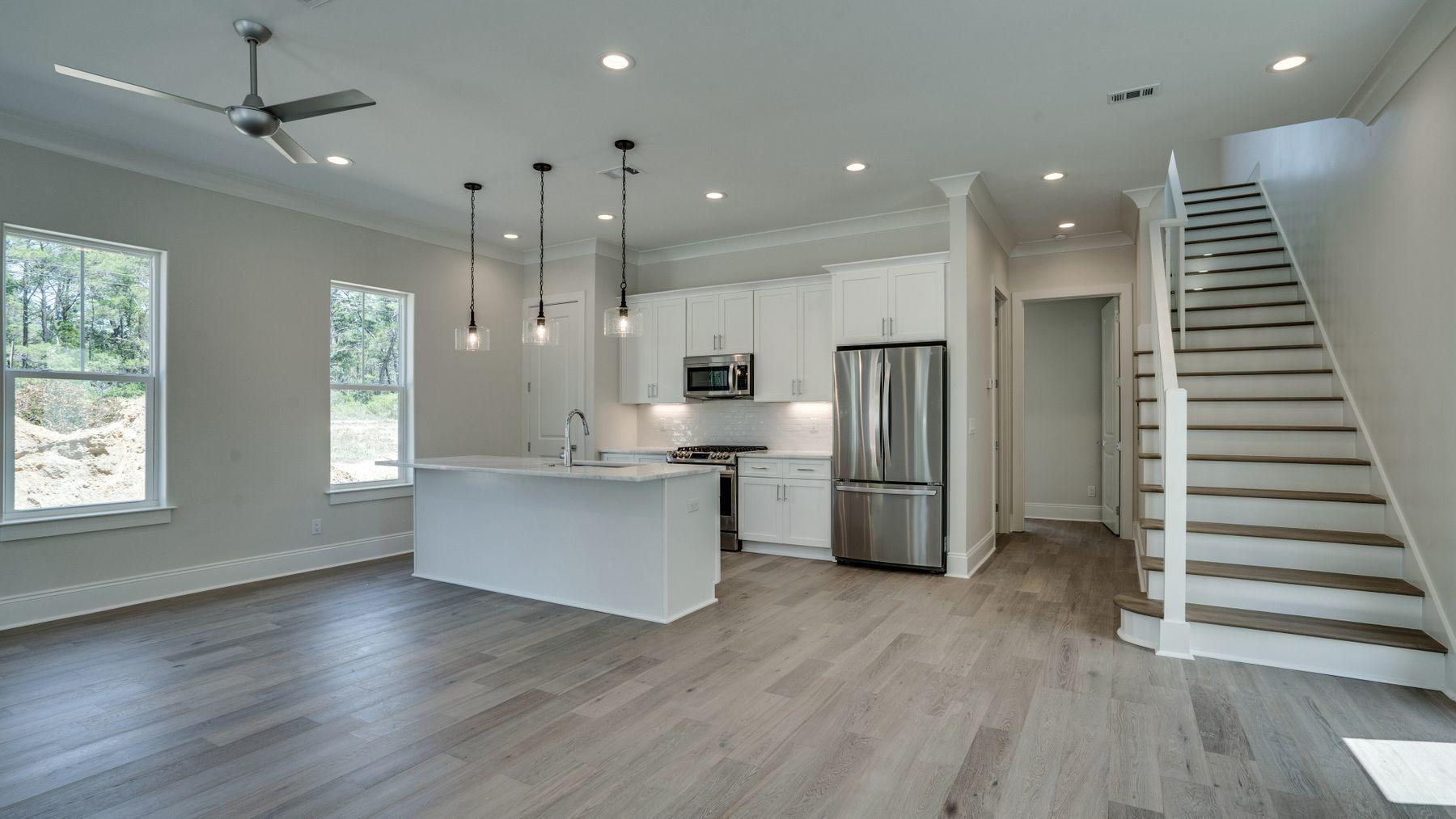 68 Sunset Key Inlet Beach, FL 32461 - Photo 3 of 29 a kitchen with stainless steel appliances kitchen island hardwood floor sink and window