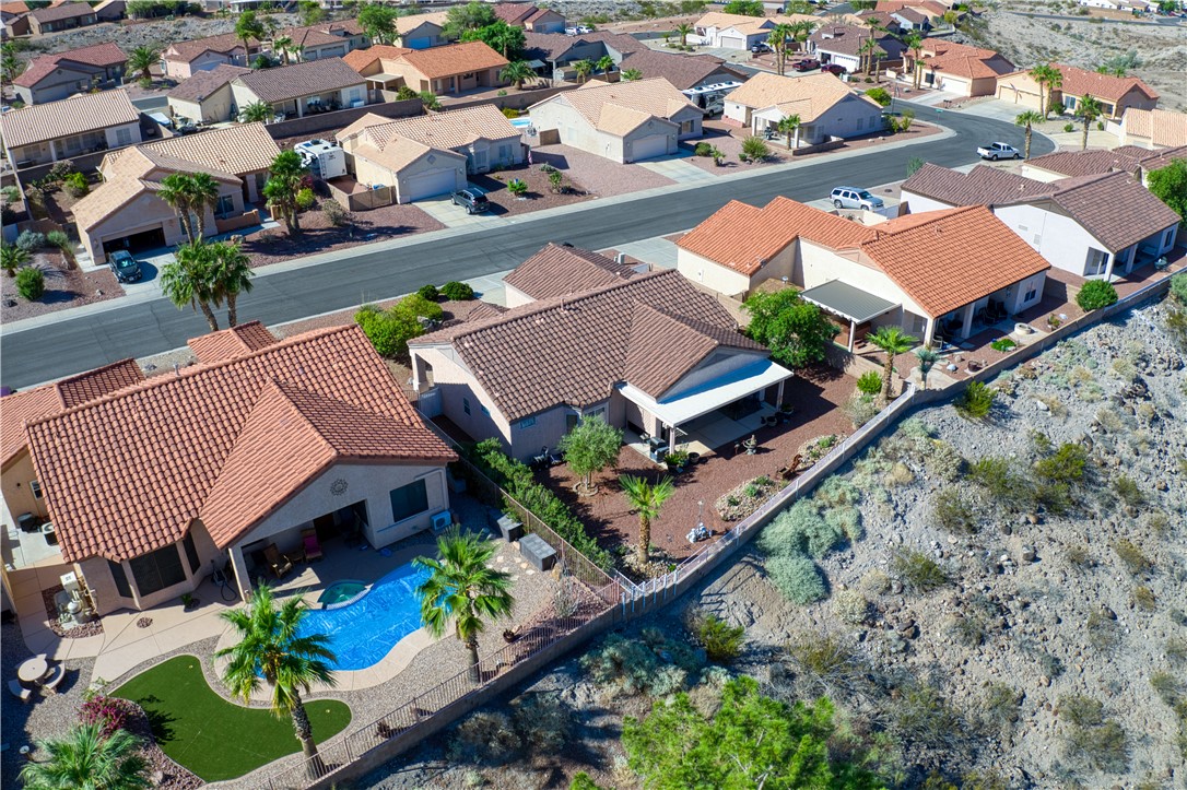 2341 Half Moon Way Bullhead City, AZ 86442 - Photo 27 of 35 Drone / aerial view of a pool area