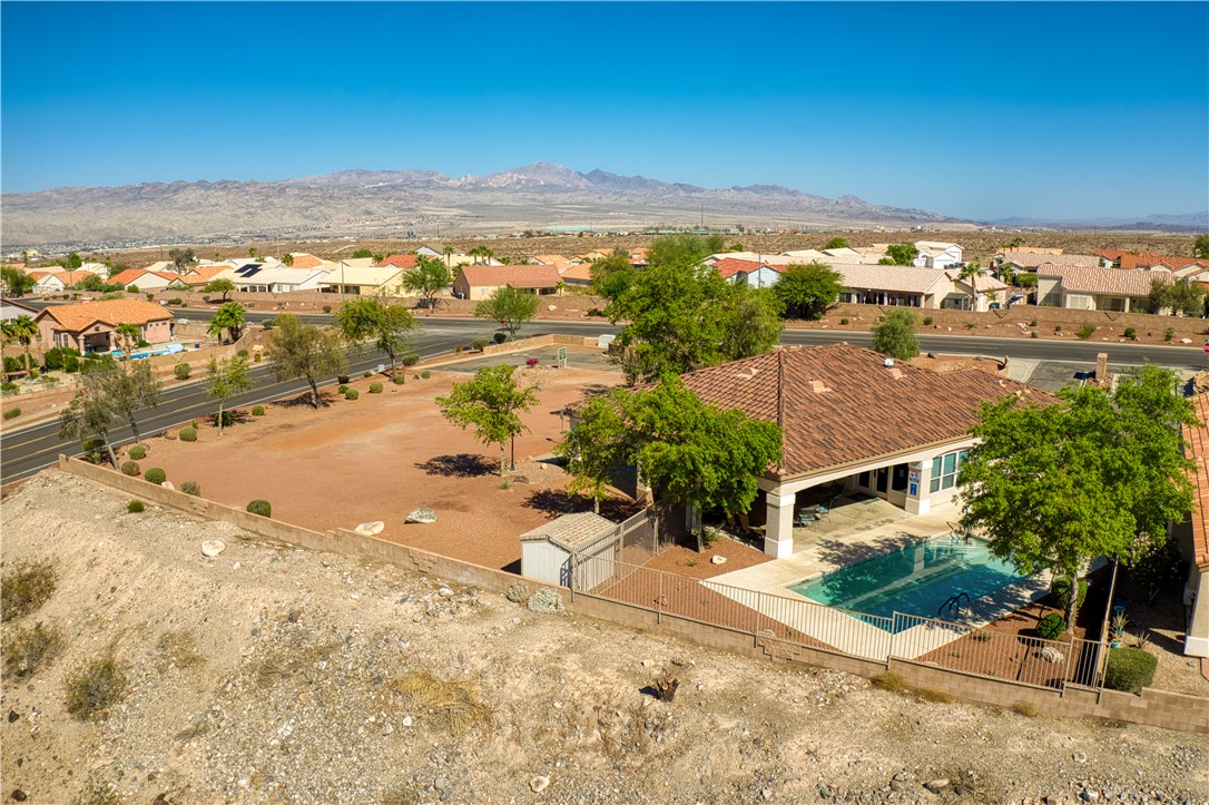 2341 Half Moon Way Bullhead City, AZ 86442 - Photo 32 of 35 Aerial view of residential area with mountains