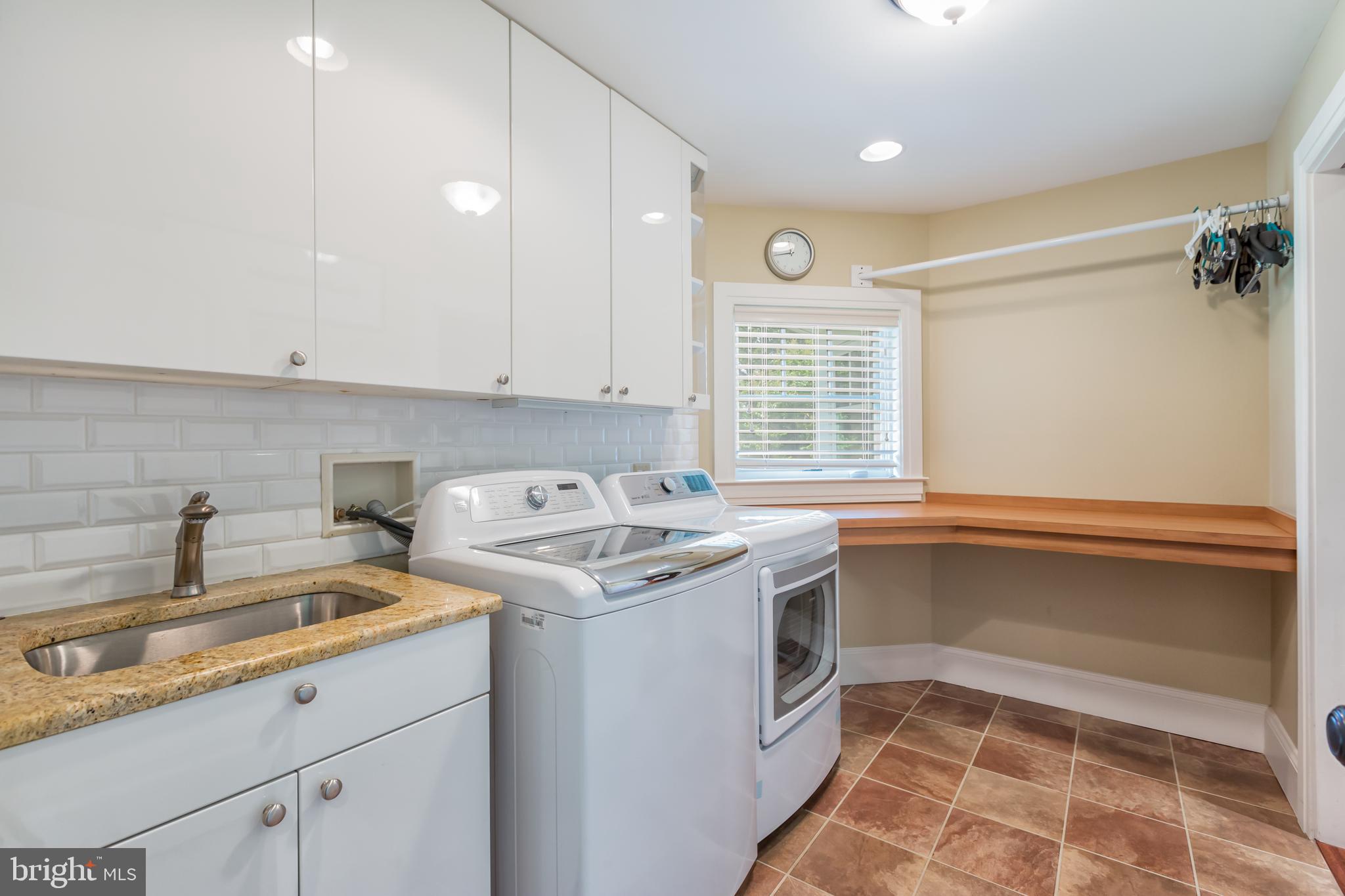 1820 Milvale Road Annapolis, MD 21409 - Photo 29 of 50 2nd floor laundry room with folding area and sink