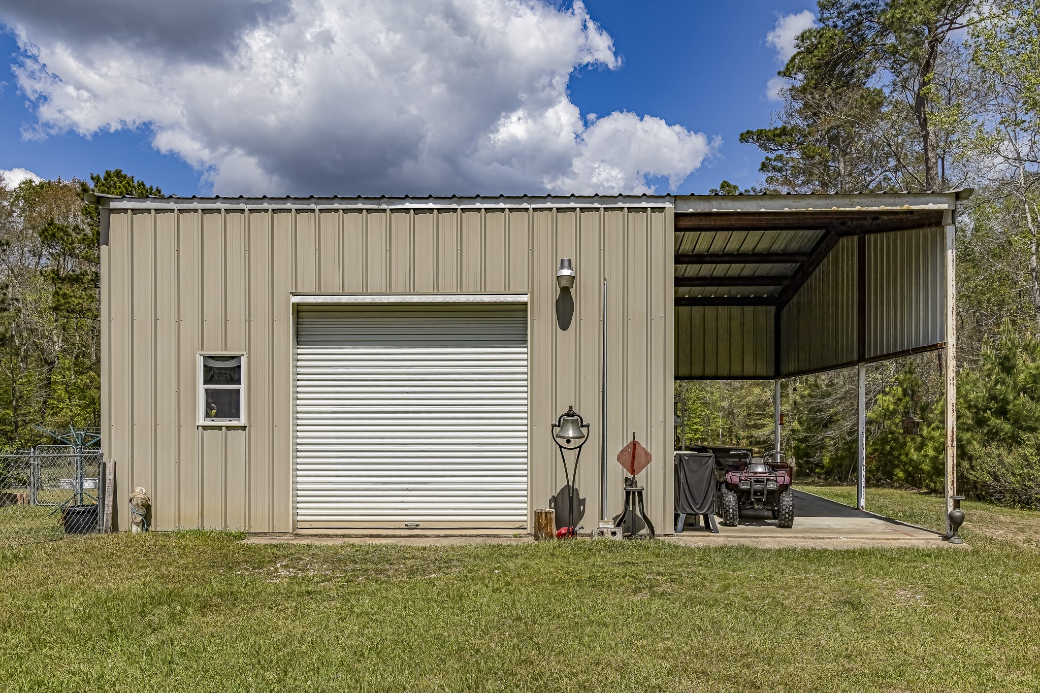 188 Pullin Road Corrigan, TX 75939 - Photo 34 of 50 24x33 Insulated Shop with 12x33 Covered RV Parking w/ full hook ups