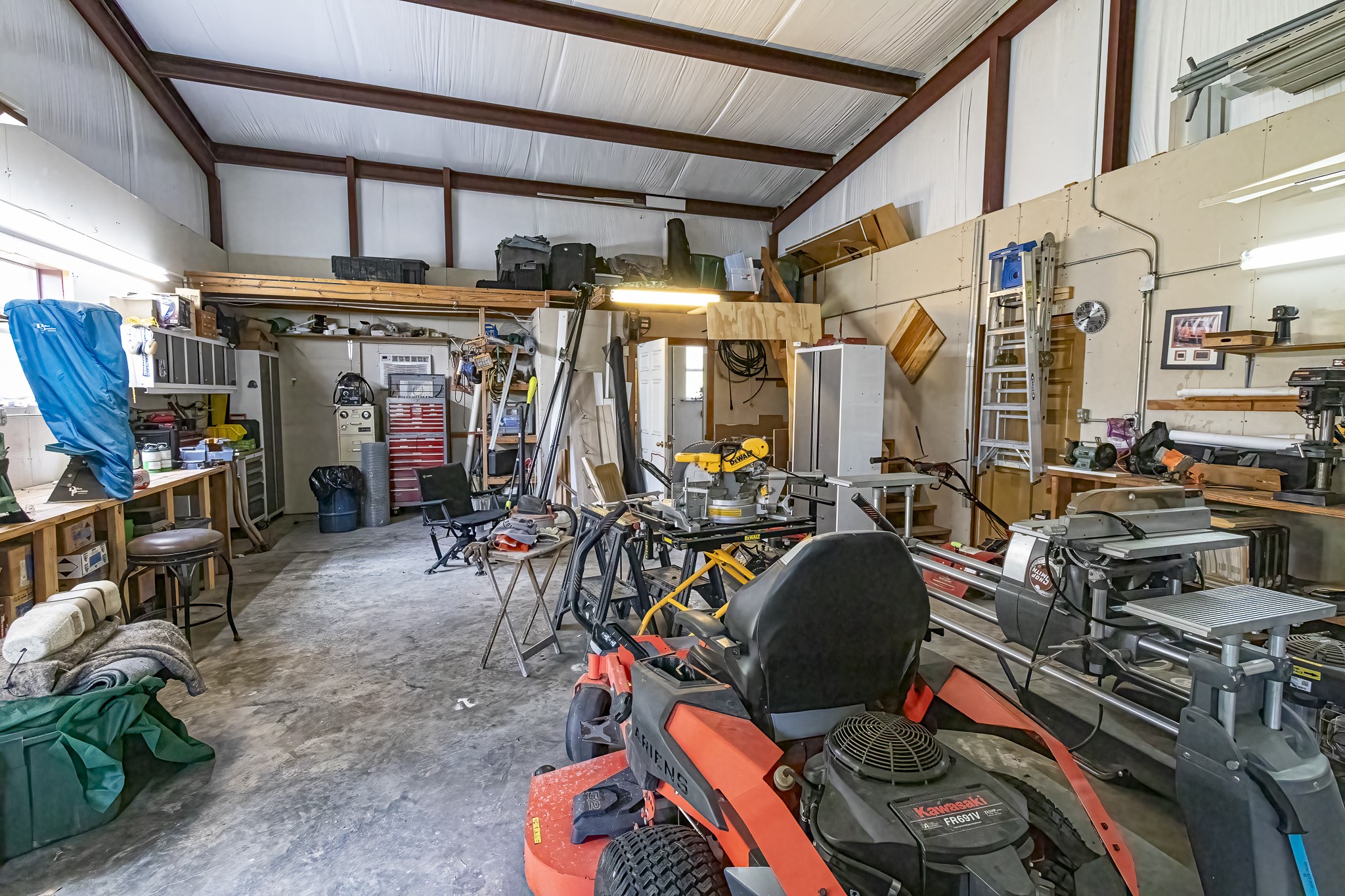 188 Pullin Road Corrigan, TX 75939 - Photo 37 of 50 24x33 Insulated high roof metal building on slab. With AC and half bath.