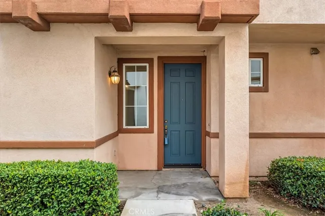 a front view of a house with a garage