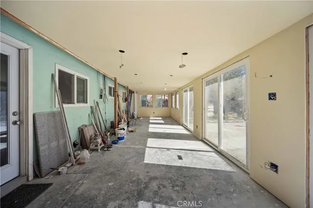a view of a hallway with staircase