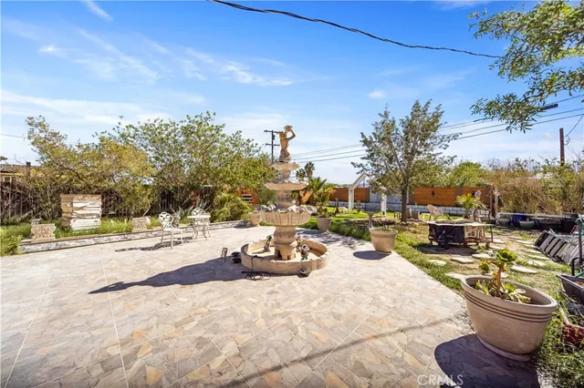 a view of a patio with swimming pool