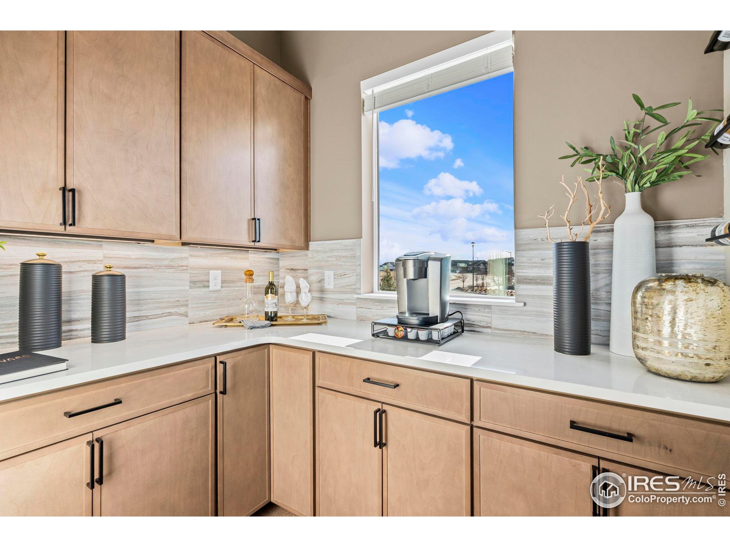 3016 Windward Way Fort Collins, CO 80524 - Photo 17 of 49 a kitchen with sink and cabinets