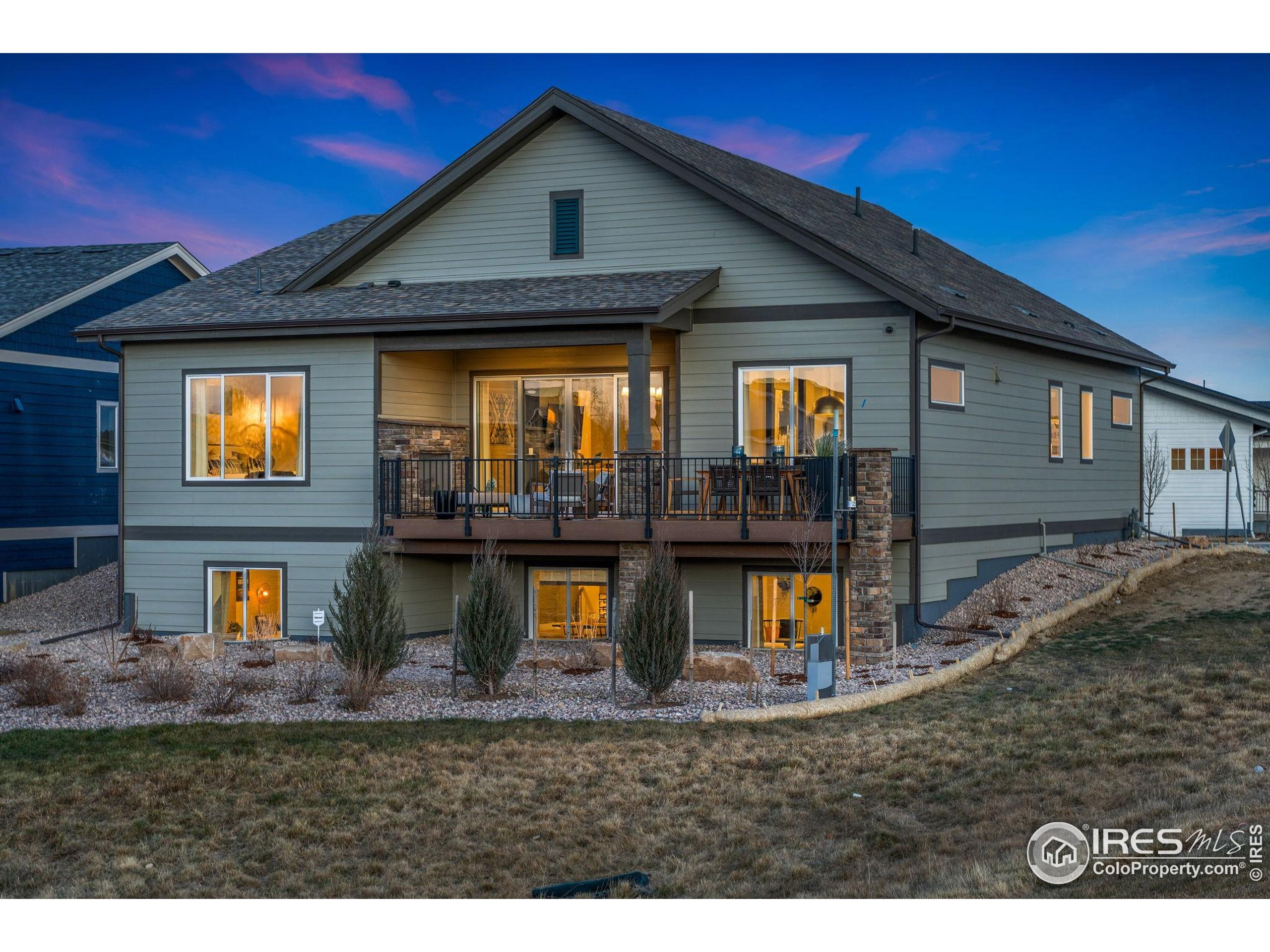 3016 Windward Way Fort Collins, CO 80524 - Photo 47 of 49 a view of a house with roof deck