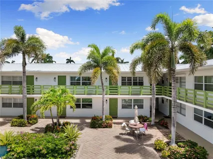 a view of a house with patio outdoor seating