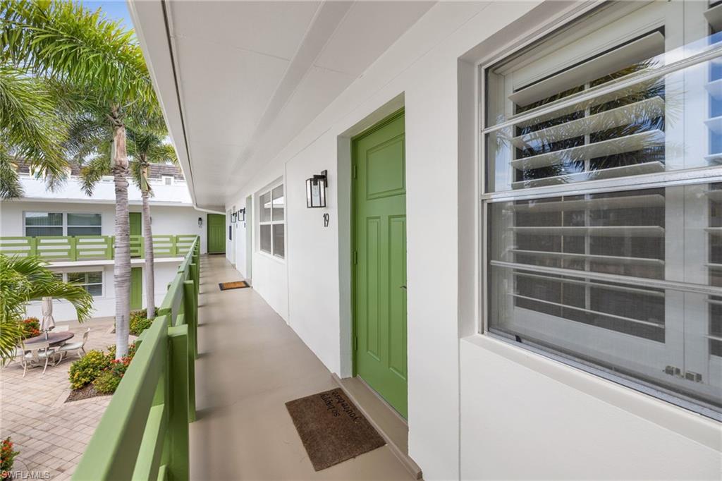 975 9th Avenue South, Unit 19 Naples, FL 34102 - Photo 15 of 19 a view of a house with a door and a window