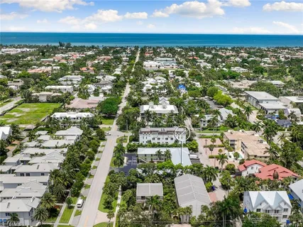 an aerial view of residential building with parking space