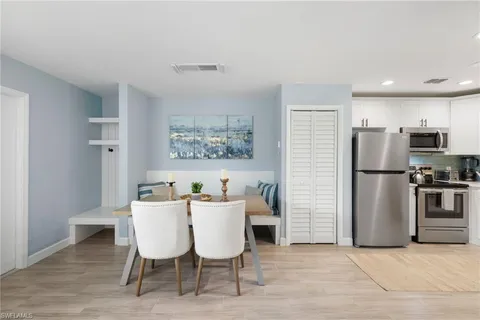 a view of a dining room with furniture