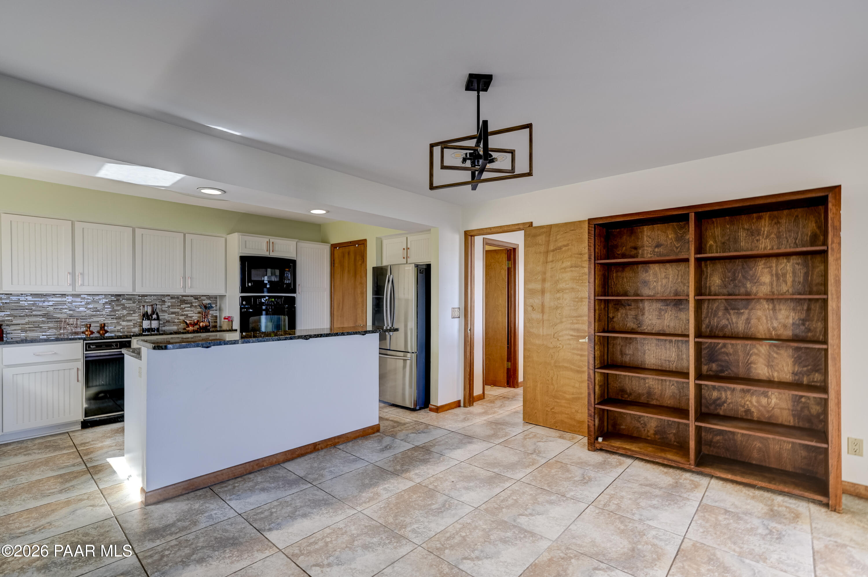 2480 Ridge Road Prescott, AZ 86301 - Photo 13 of 66 a view of kitchen with stainless steel appliances granite countertop a refrigerator and a stove top oven