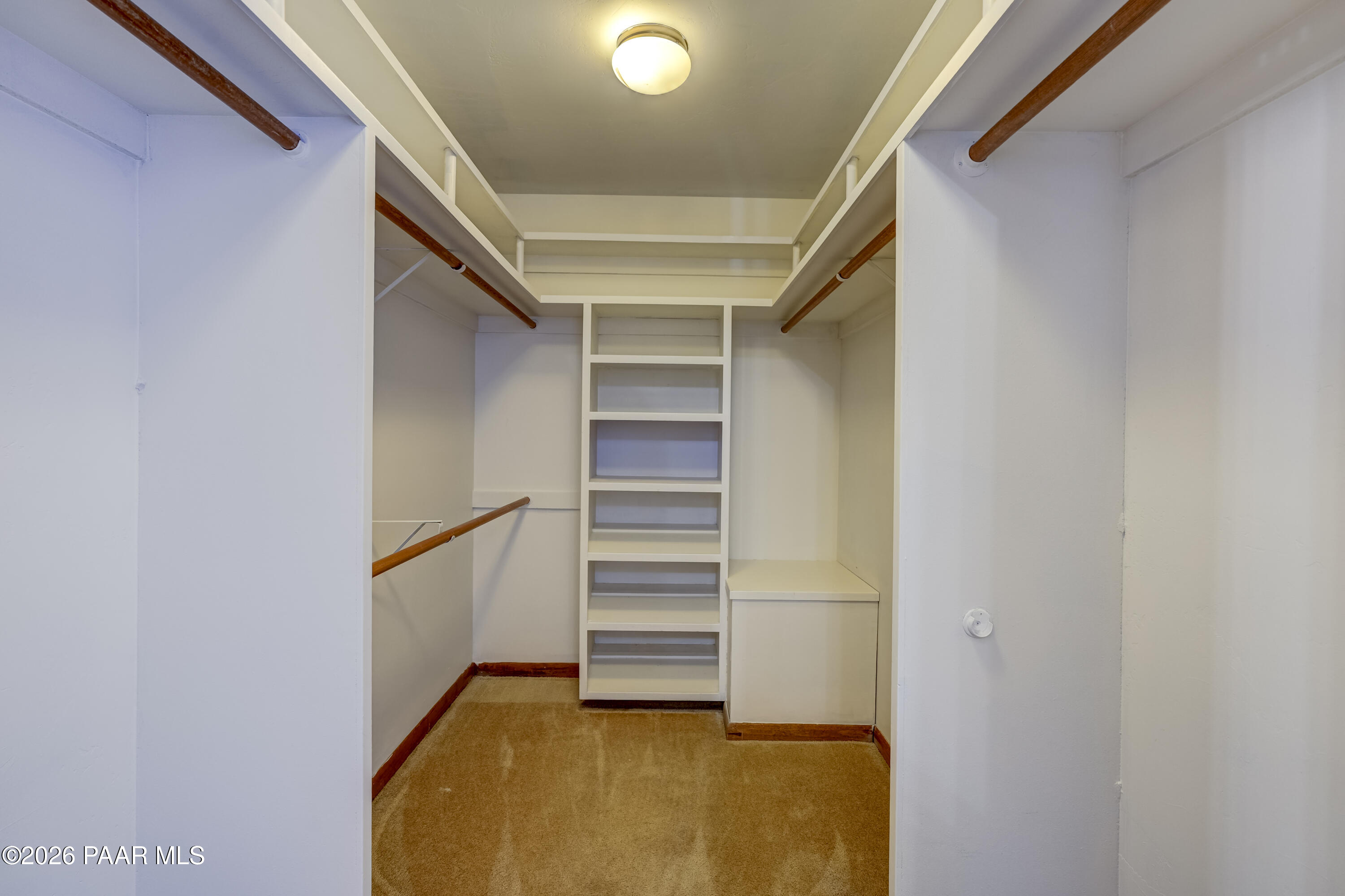 2480 Ridge Road Prescott, AZ 86301 - Photo 25 of 66 a view of walk in closet with empty racks