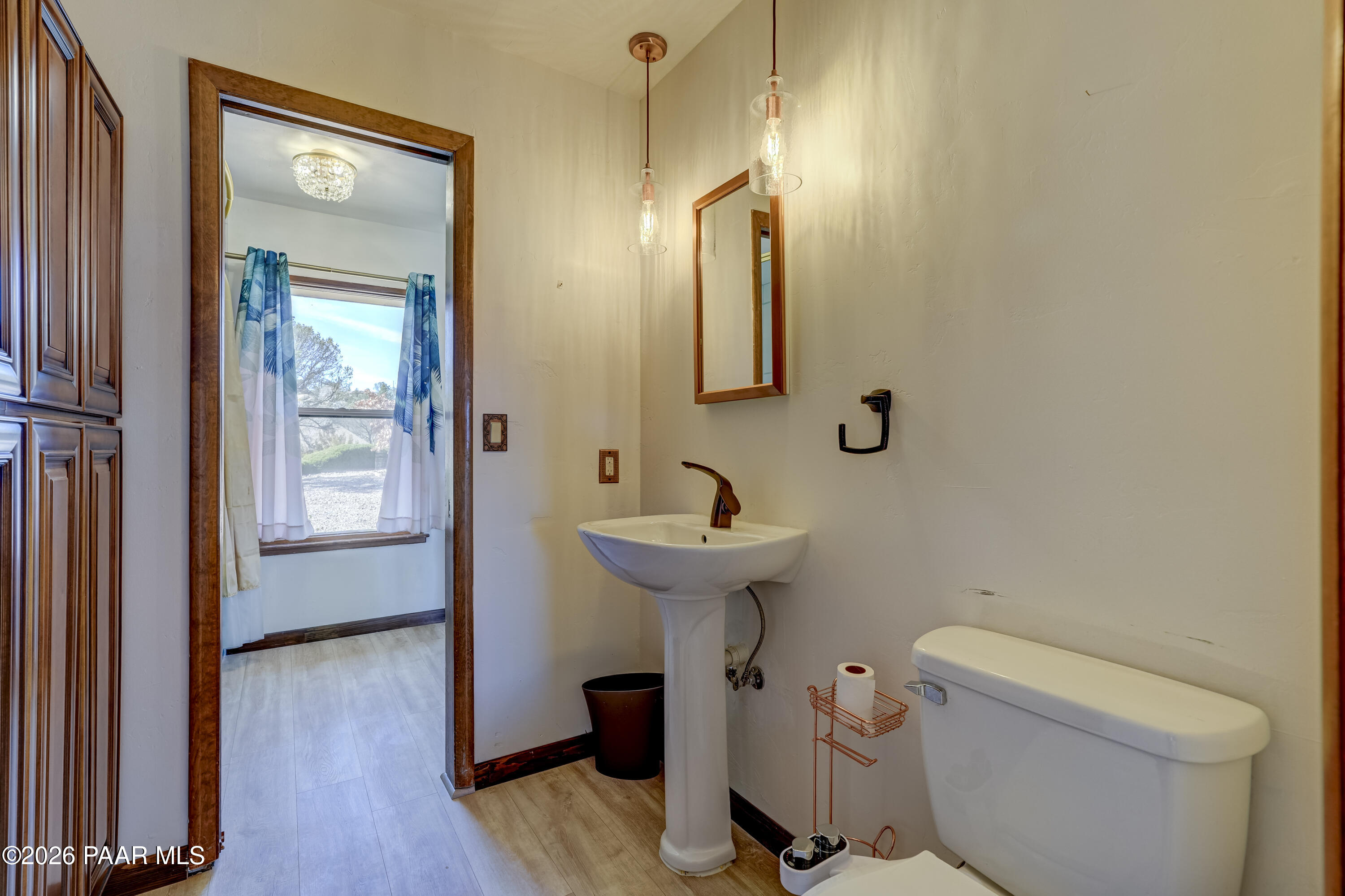 2480 Ridge Road Prescott, AZ 86301 - Photo 26 of 66 a bathroom with a sink toilet and mirror