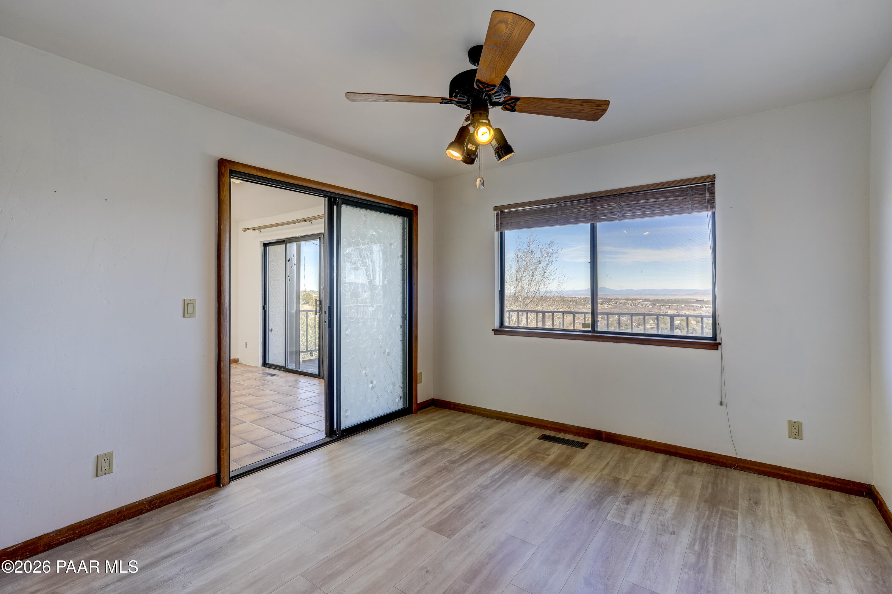 2480 Ridge Road Prescott, AZ 86301 - Photo 27 of 66 a view of empty room with wooden floor and fan