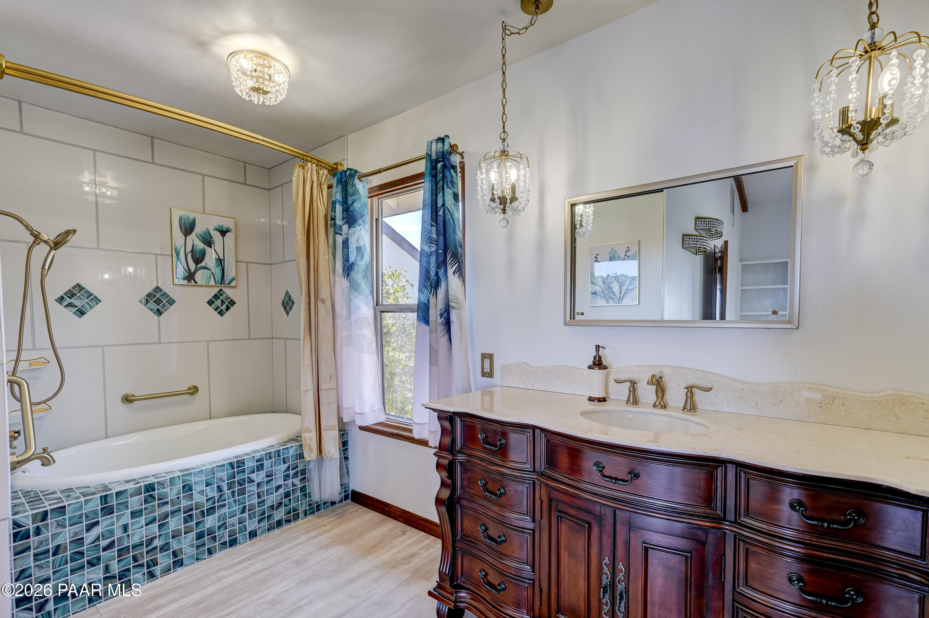 2480 Ridge Road Prescott, AZ 86301 - Photo 28 of 66 a bathroom with a tub a sink and mirror