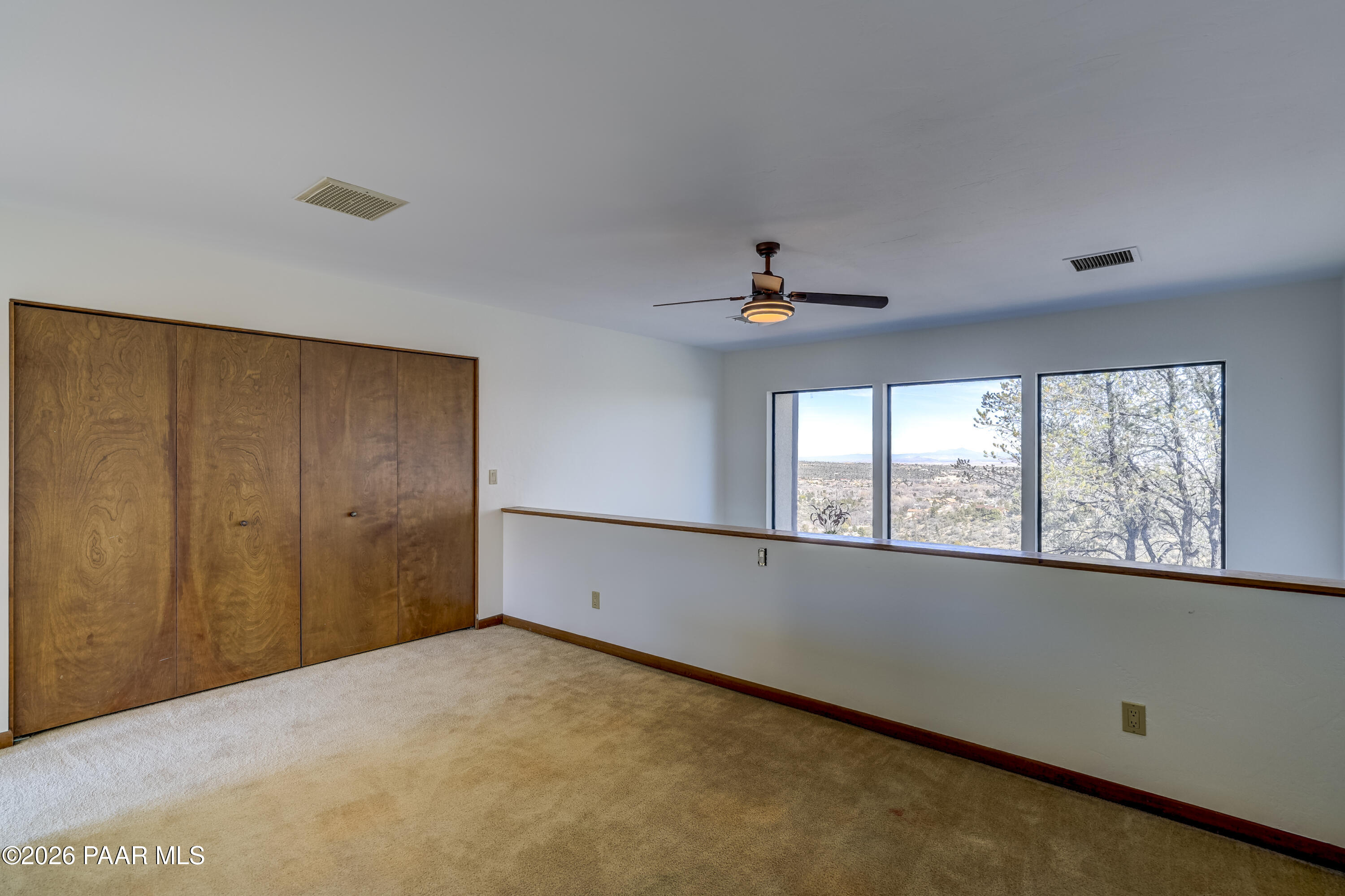 2480 Ridge Road Prescott, AZ 86301 - Photo 30 of 66 a view of an empty room with a window