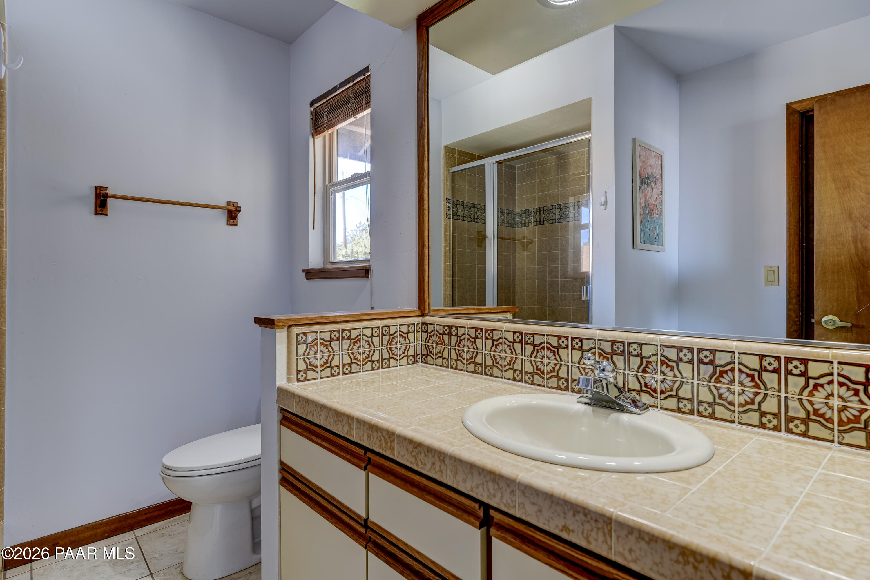 2480 Ridge Road Prescott, AZ 86301 - Photo 33 of 66 a bathroom with a sink and a toilet