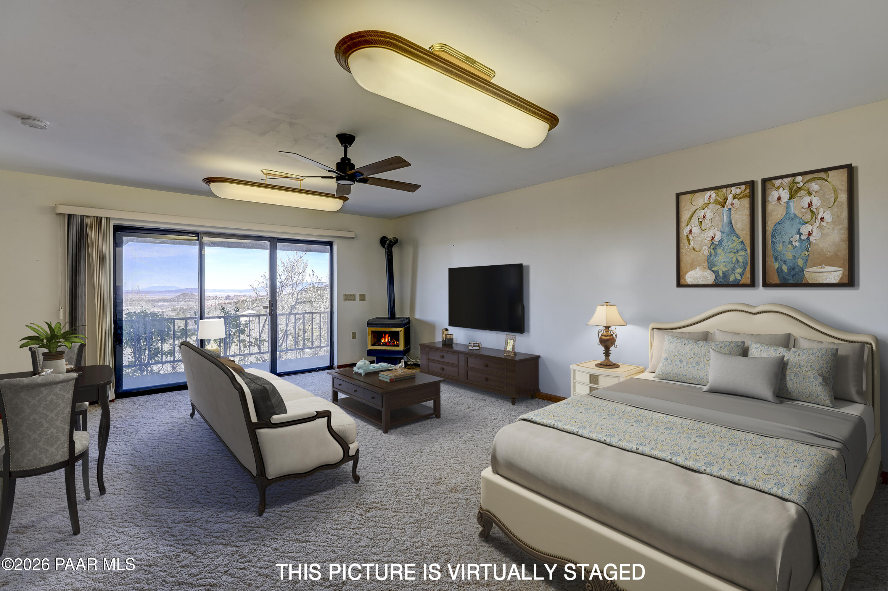 2480 Ridge Road Prescott, AZ 86301 - Photo 39 of 66 a bedroom with furniture and a flat screen tv