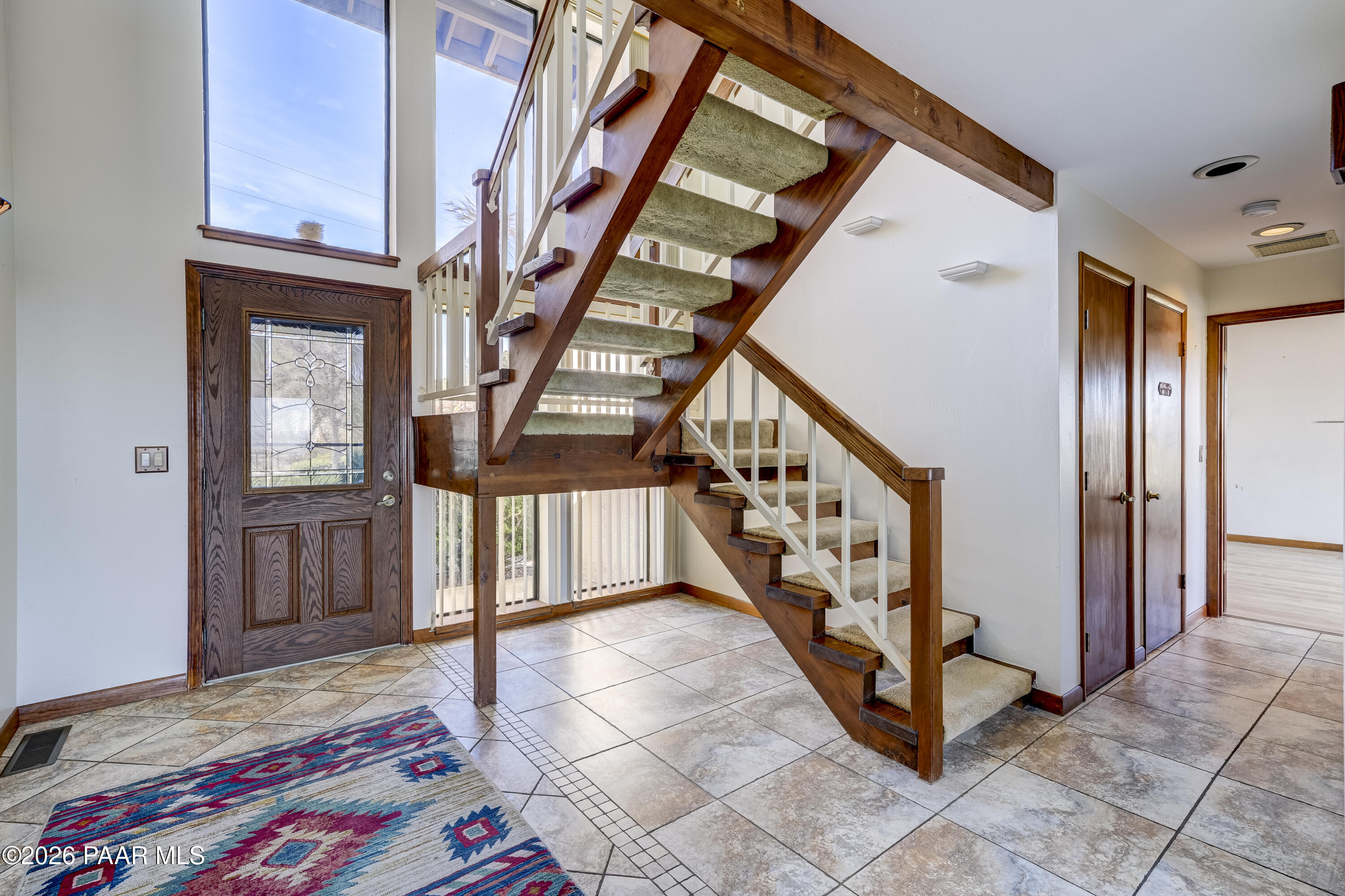 2480 Ridge Road Prescott, AZ 86301 - Photo 4 of 66 a view of an entryway with wooden floor and windows