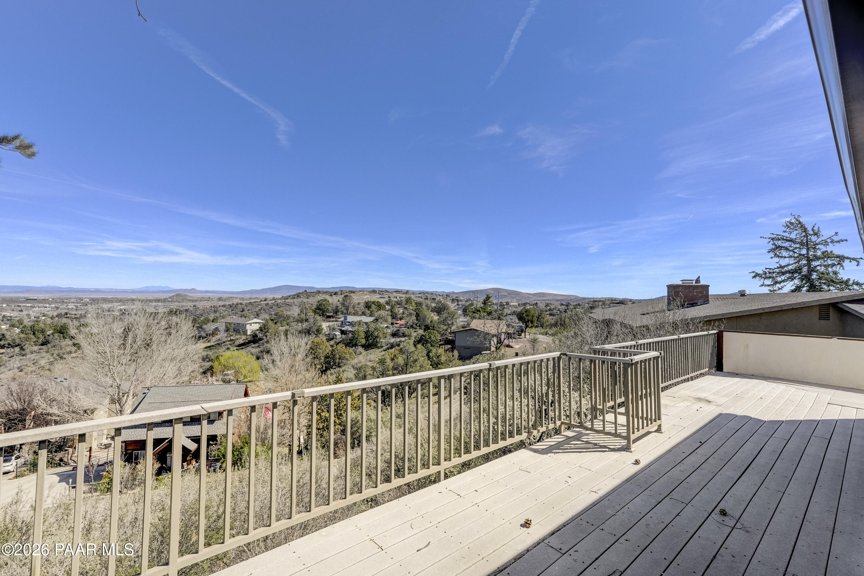 2480 Ridge Road Prescott, AZ 86301 - Photo 49 of 66 a view of a balcony with wooden floor and city view