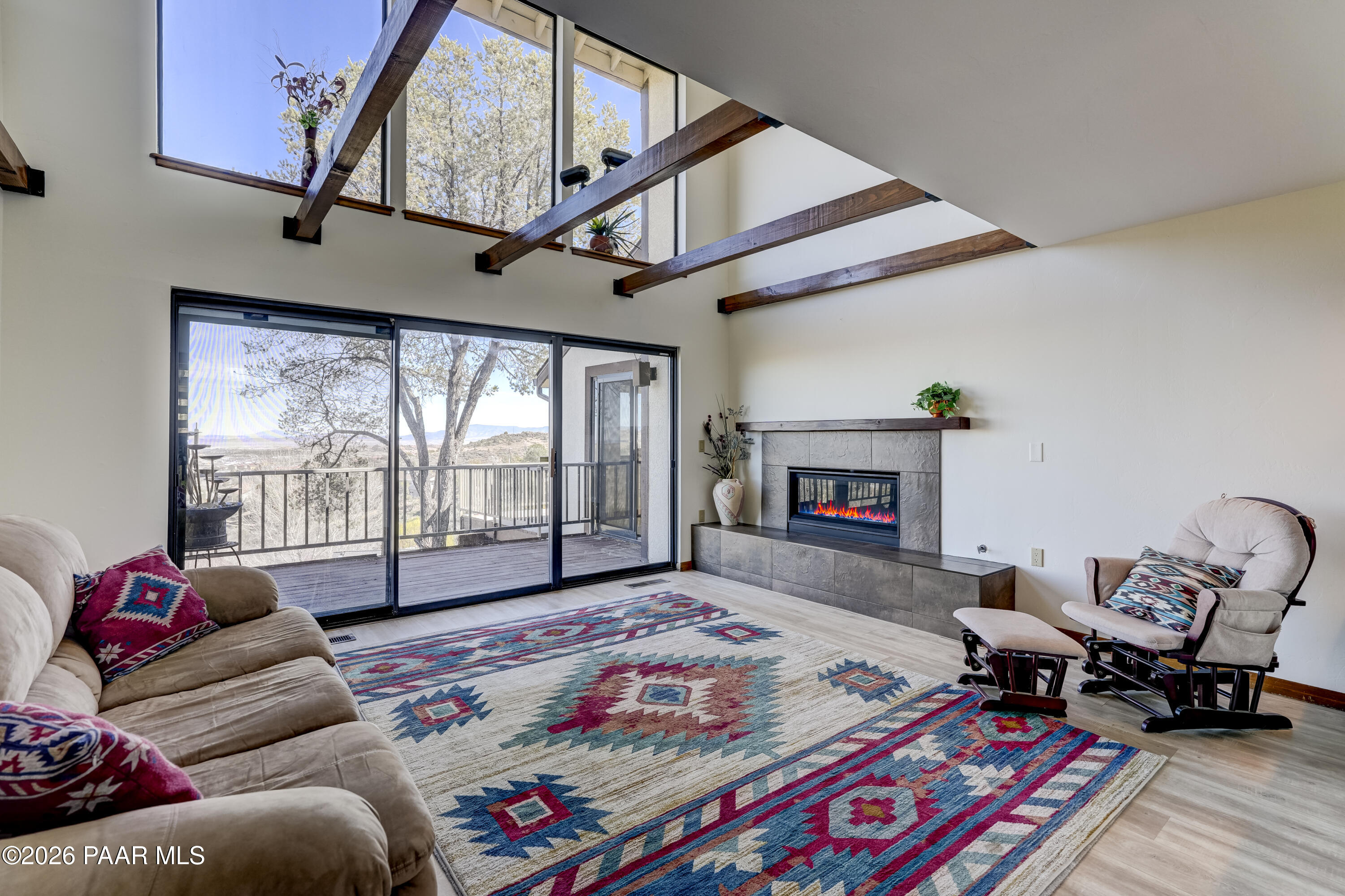 2480 Ridge Road Prescott, AZ 86301 - Photo 5 of 66 a bedroom with furniture and a fireplace