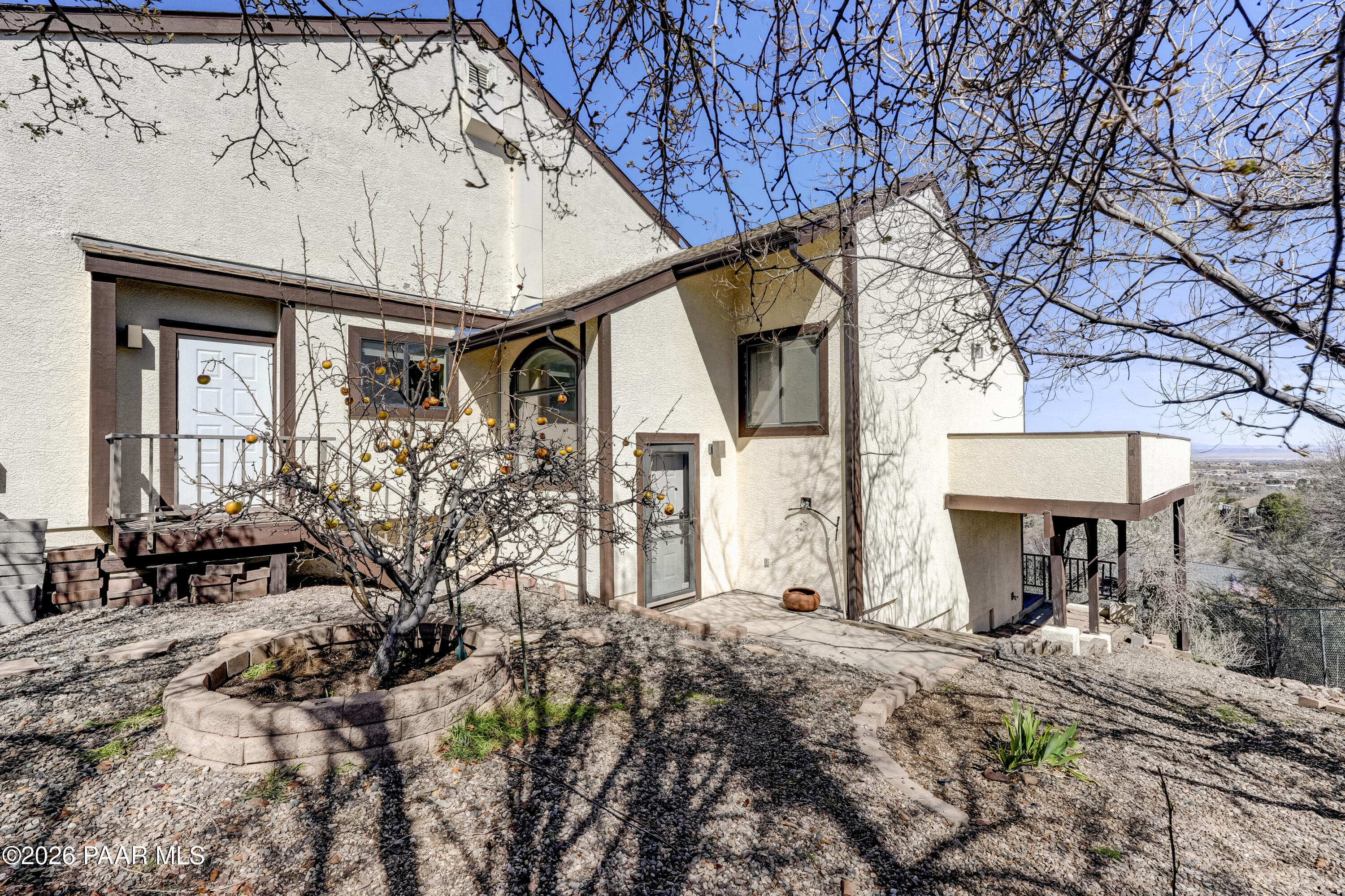 2480 Ridge Road Prescott, AZ 86301 - Photo 51 of 66 a front view of a house with garden