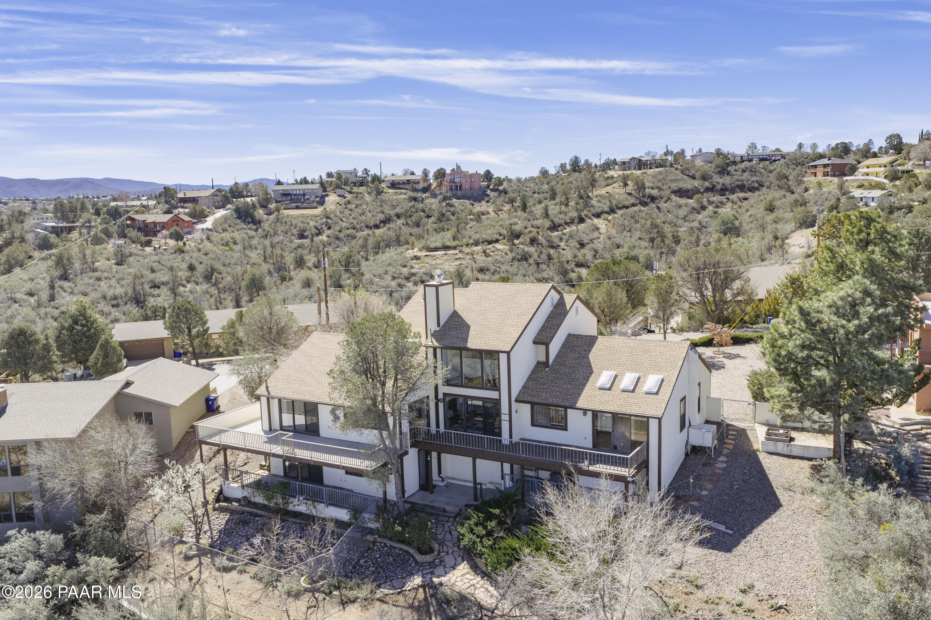 2480 Ridge Road Prescott, AZ 86301 - Photo 55 of 66 an aerial view of a house with a yard and mountain view in back