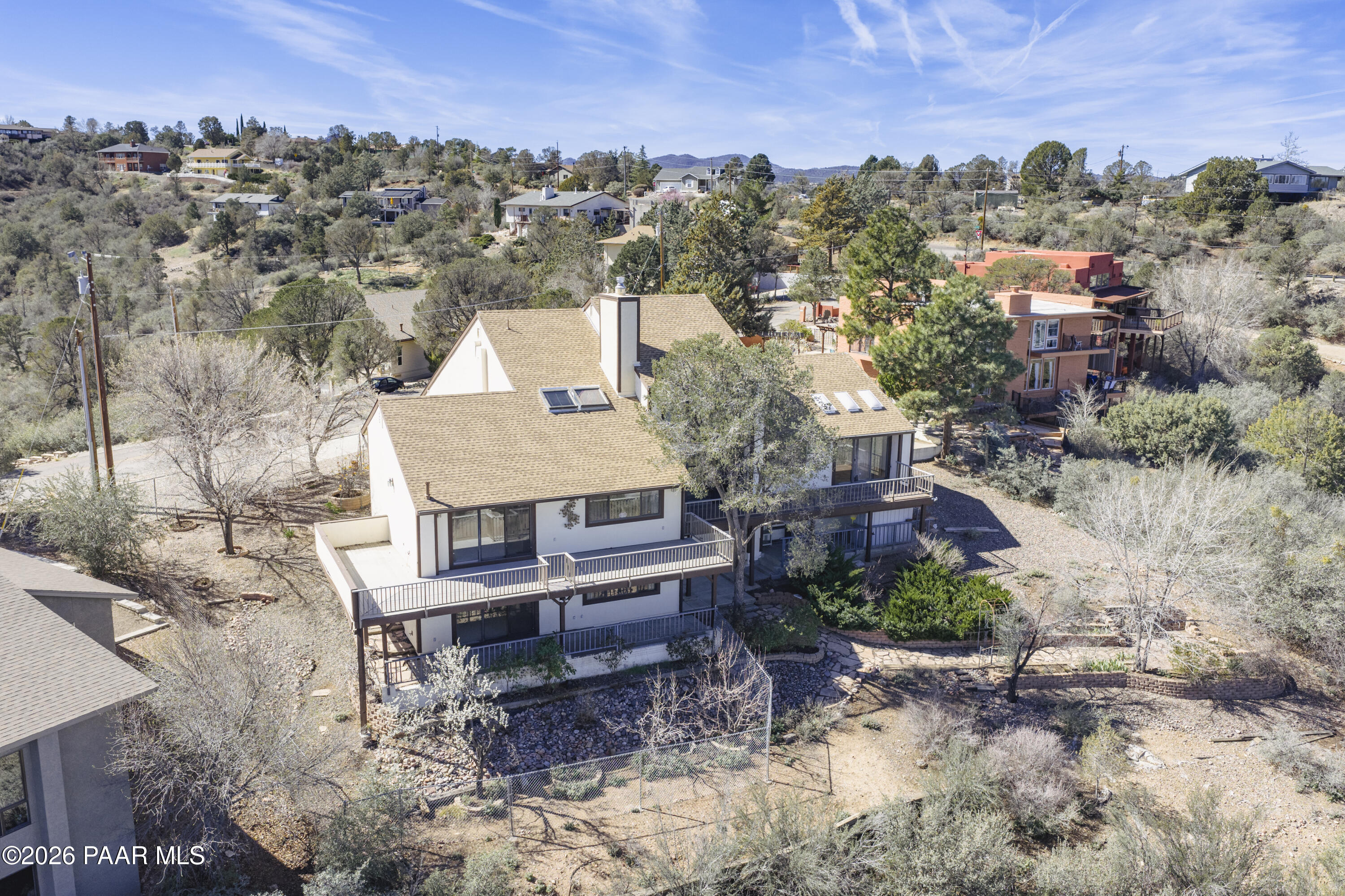 2480 Ridge Road Prescott, AZ 86301 - Photo 57 of 66 an aerial view of a house with a yard and lake view
