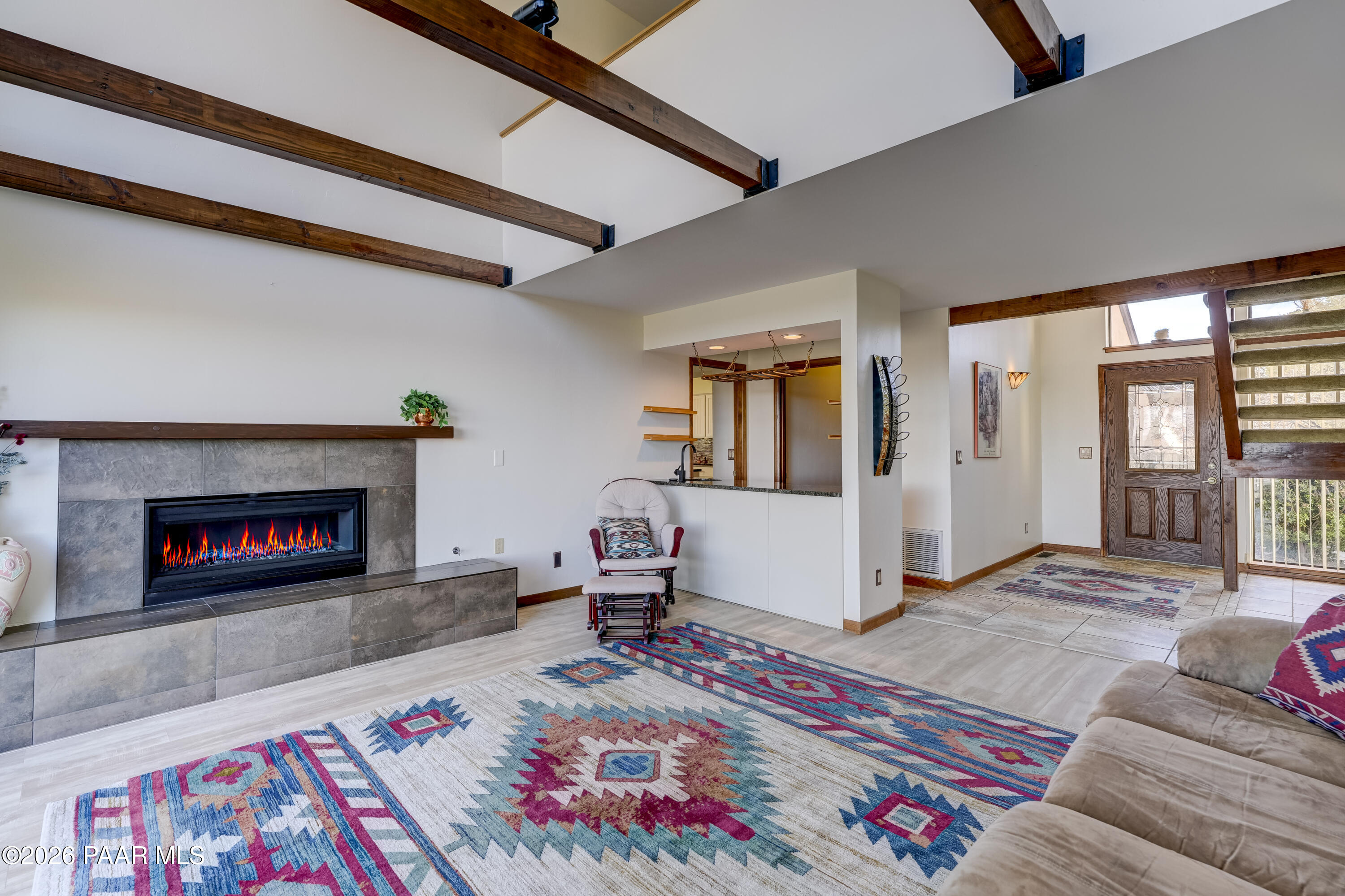 2480 Ridge Road Prescott, AZ 86301 - Photo 7 of 66 a living room with furniture and a fireplace