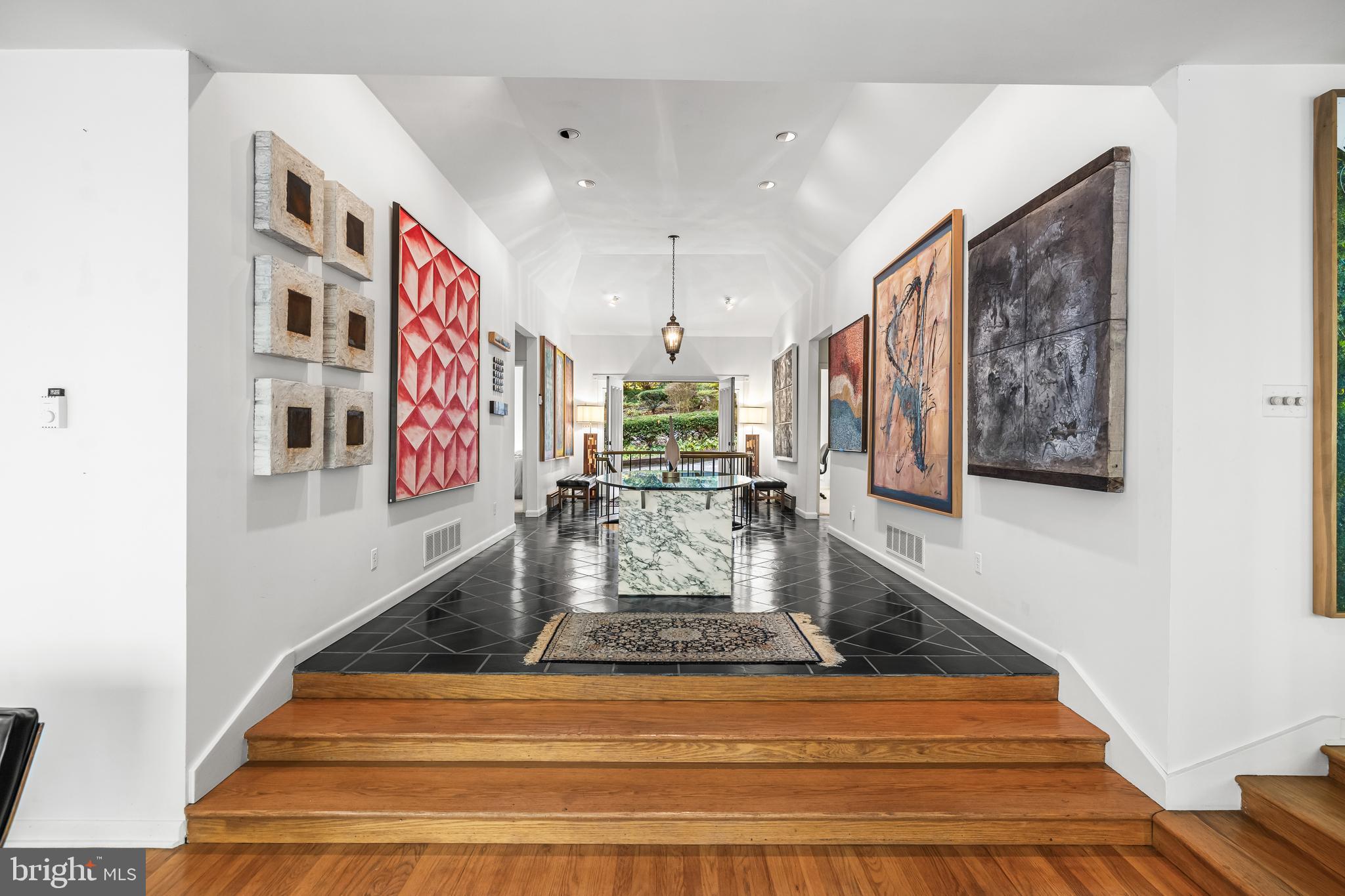 1106 High Country Road Towson, MD 21286 - Photo 27 of 77 a view of entryway and hall with wooden floor