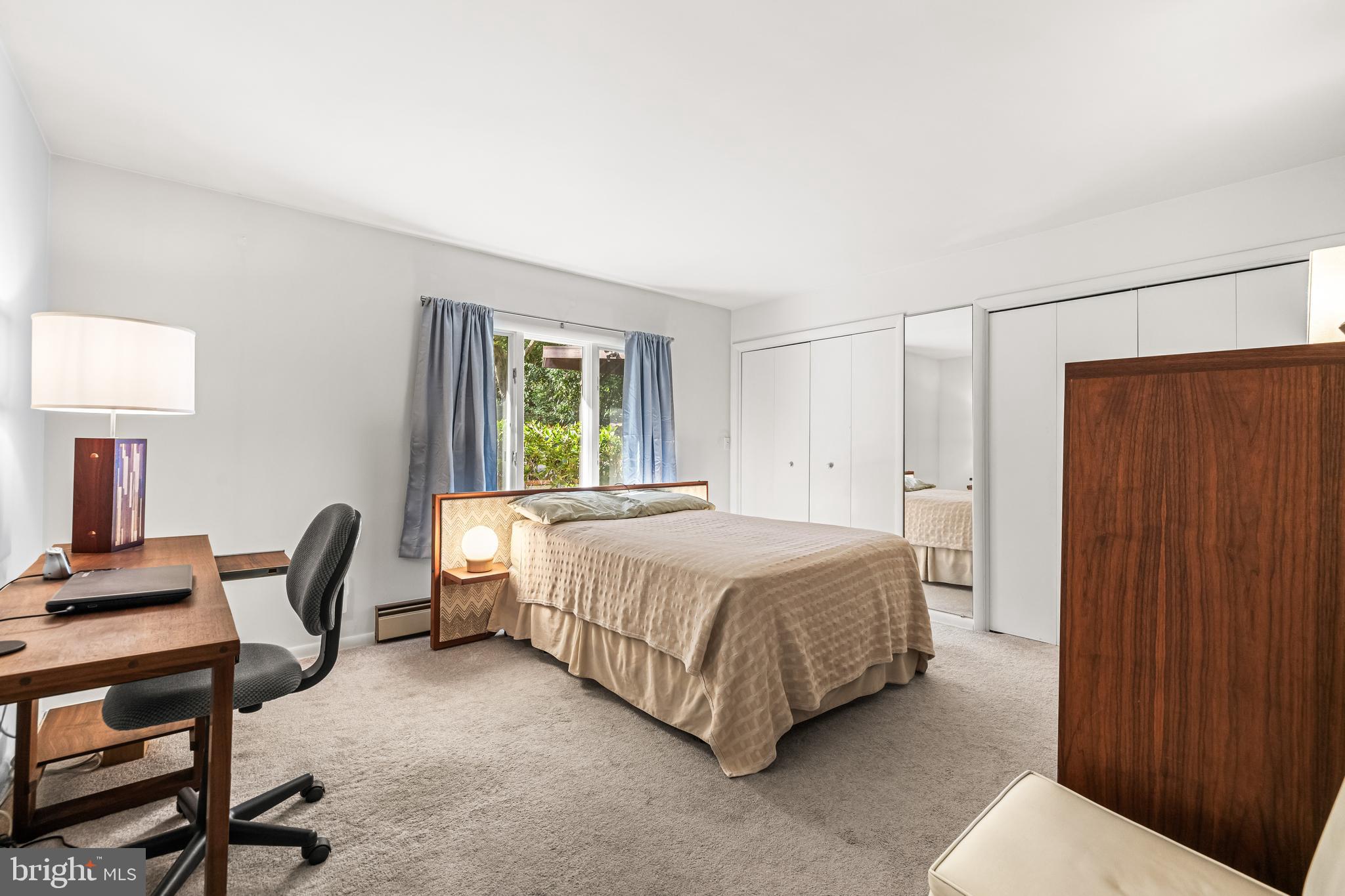 1106 High Country Road Towson, MD 21286 - Photo 31 of 77 a bedroom with a bed chair and a window