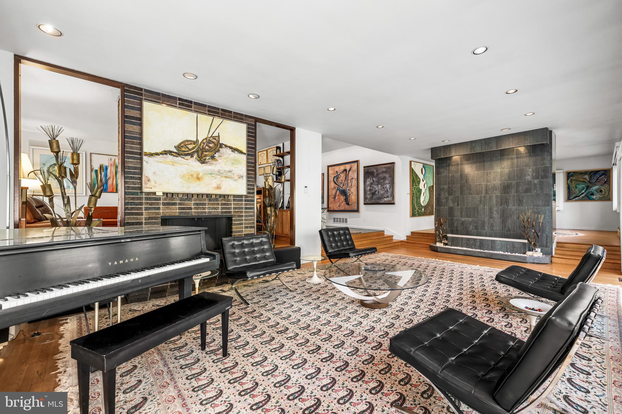 1106 High Country Road Towson, MD 21286 - Photo 42 of 77 a living room with furniture and a flat screen tv