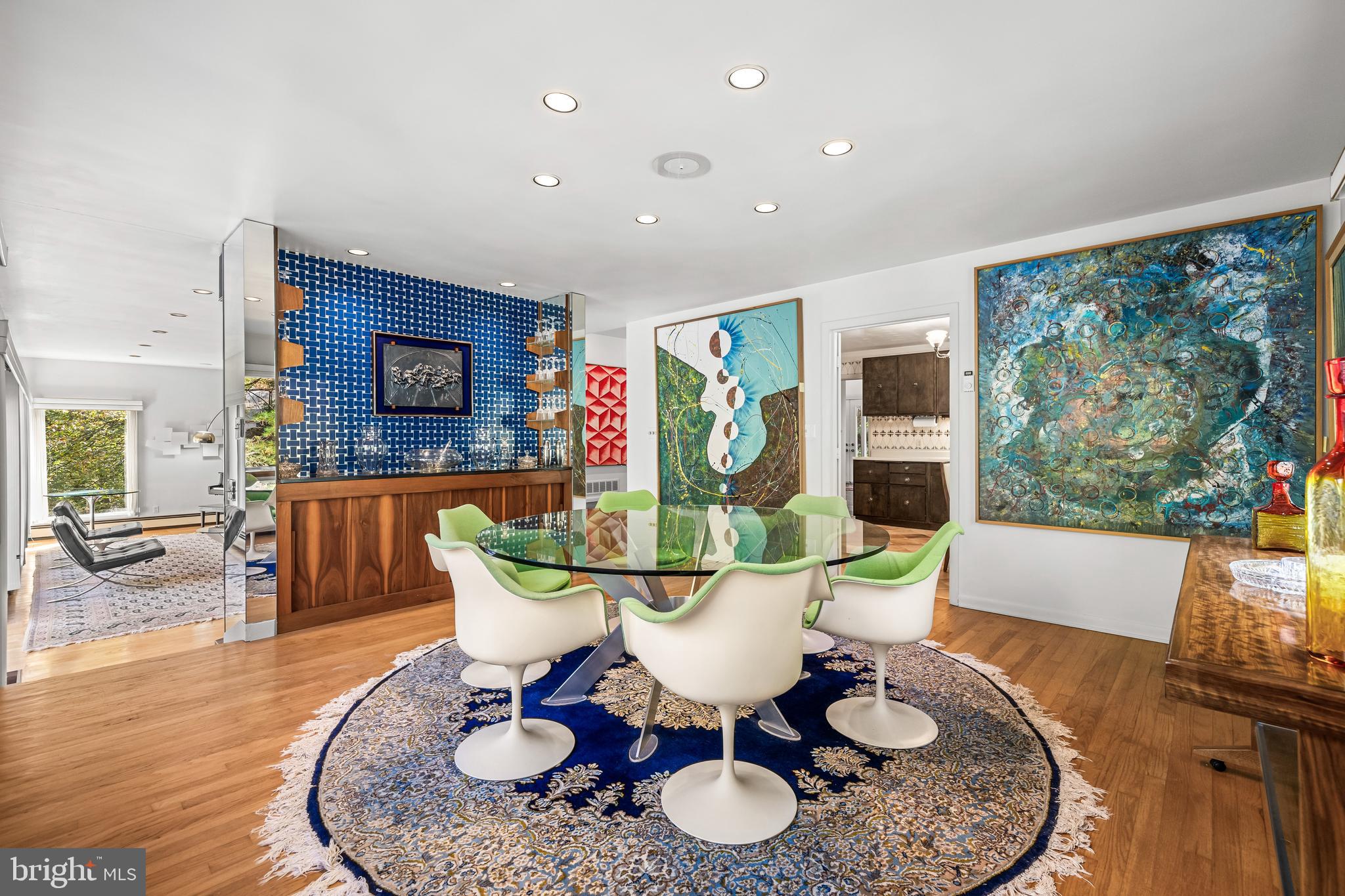 1106 High Country Road Towson, MD 21286 - Photo 50 of 77 a living room with furniture a rug and a flat screen tv