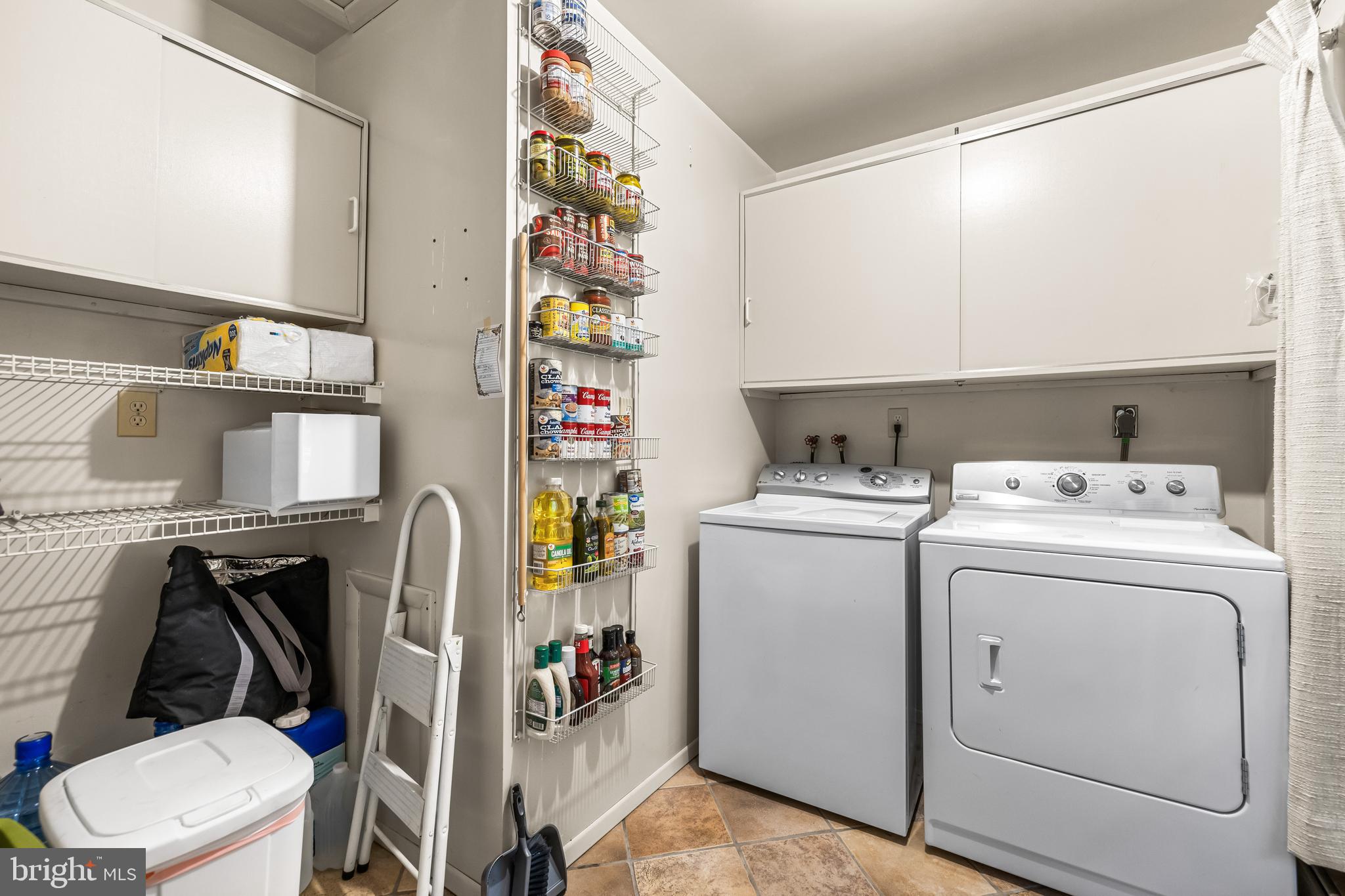 1106 High Country Road Towson, MD 21286 - Photo 53 of 77 a utility room with dryer and washer