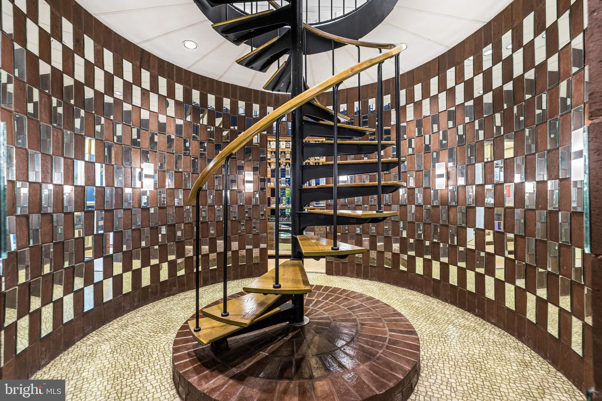 1106 High Country Road Towson, MD 21286 - Photo 54 of 77 Spiral staircase to lower level