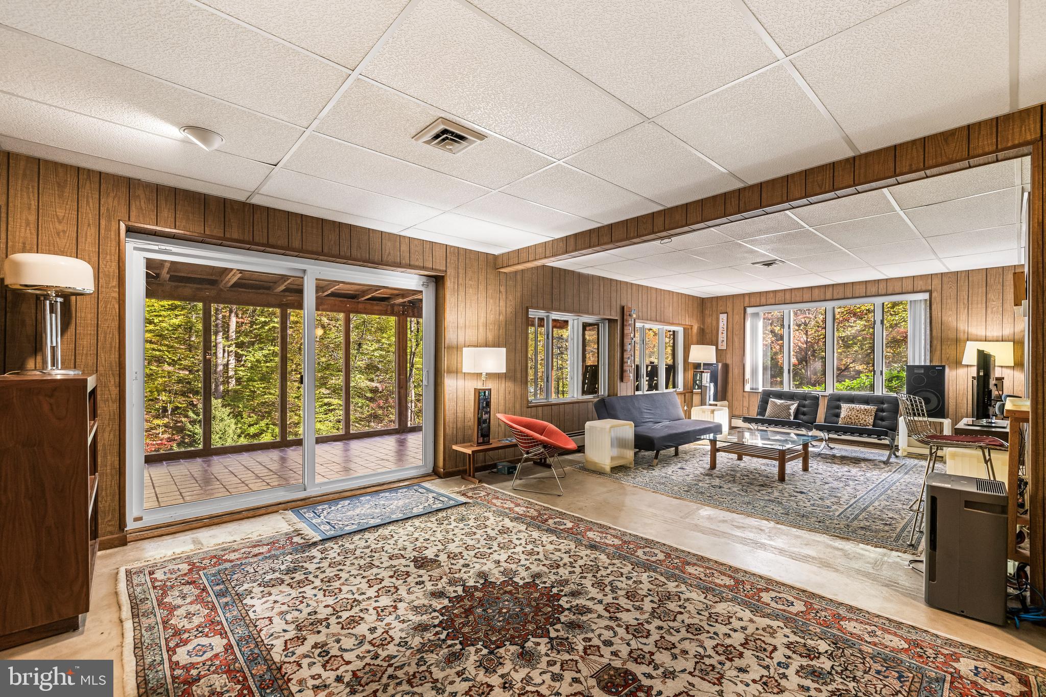 1106 High Country Road Towson, MD 21286 - Photo 63 of 77 a living room with furniture and large windows